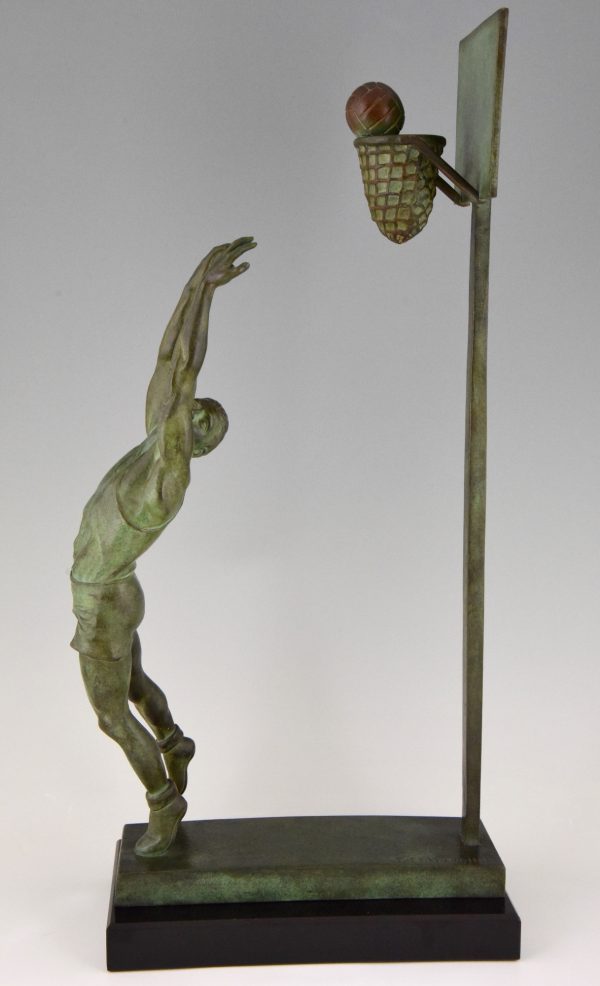 Art Deco bronze sculpture basketball player reverse dunk