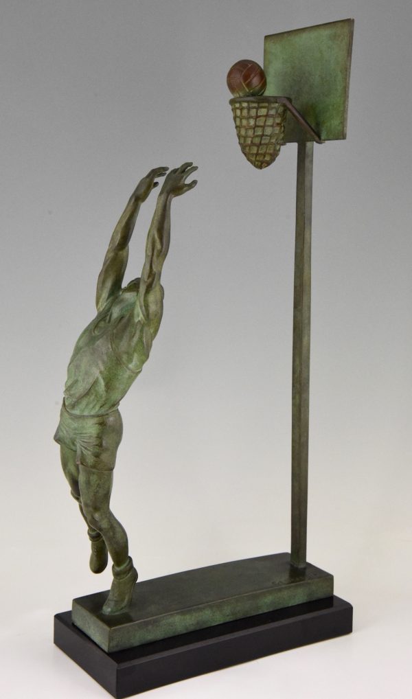 Art Deco bronze sculpture basketball player reverse dunk