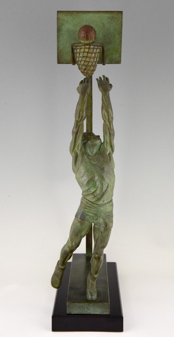 Art Deco bronze sculpture basketball player reverse dunk