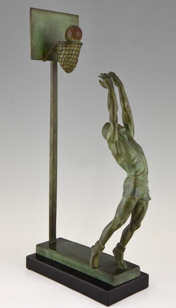 Art Deco bronze sculpture basketball player reverse dunk