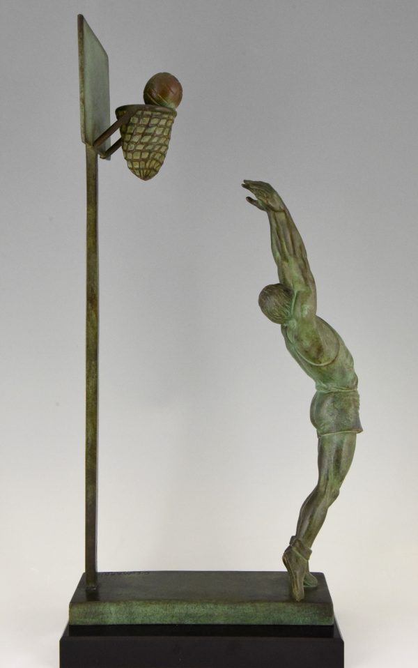 Art Deco bronze sculpture basketball player reverse dunk