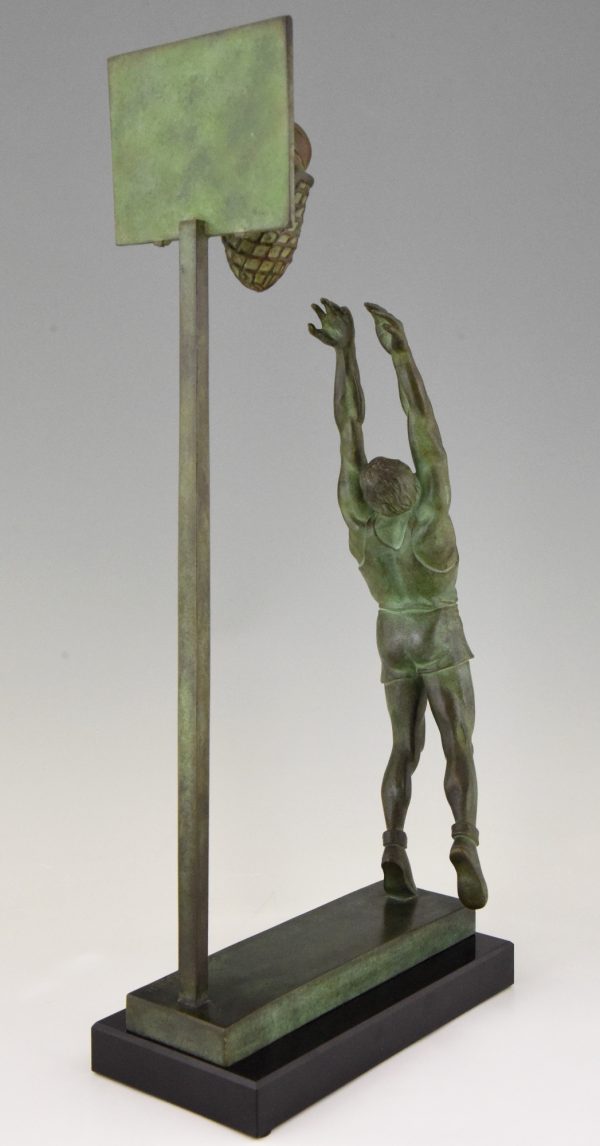 Art Deco bronze sculpture basketball player reverse dunk