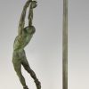 Art Deco bronze sculpture basketball player reverse dunk