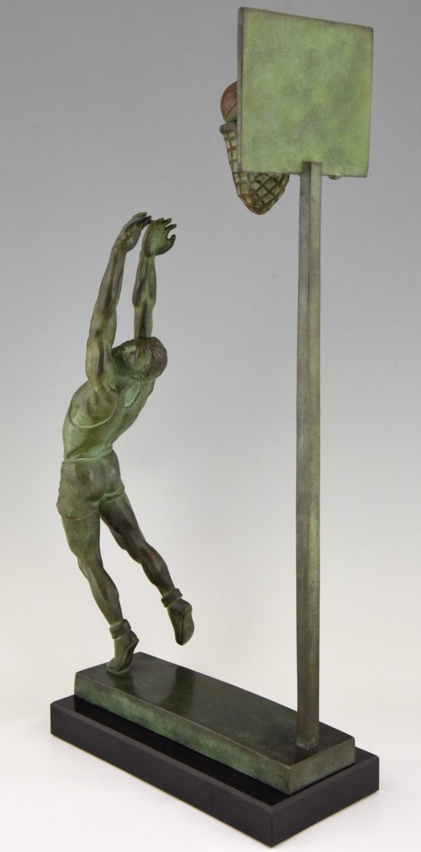 Art Deco bronze sculpture basketball player reverse dunk