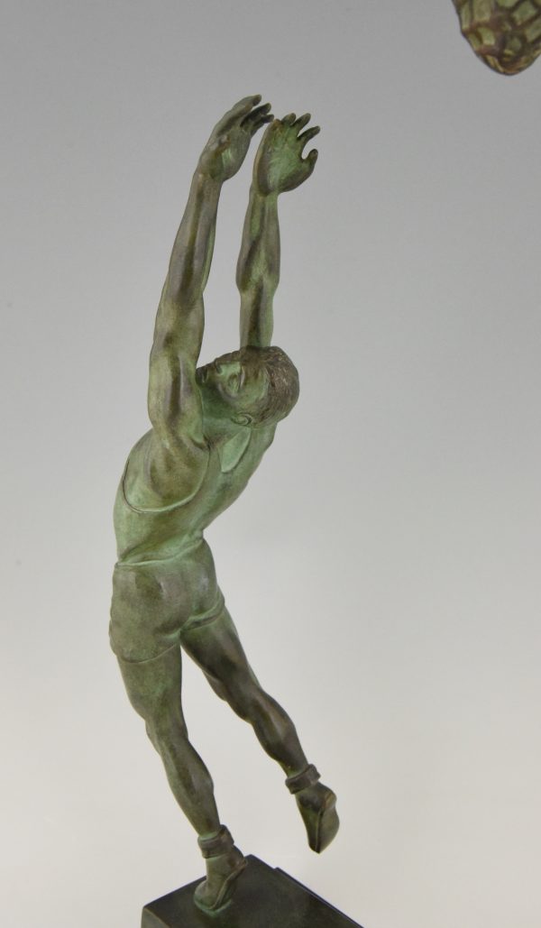 Art Deco bronze sculpture basketball player reverse dunk