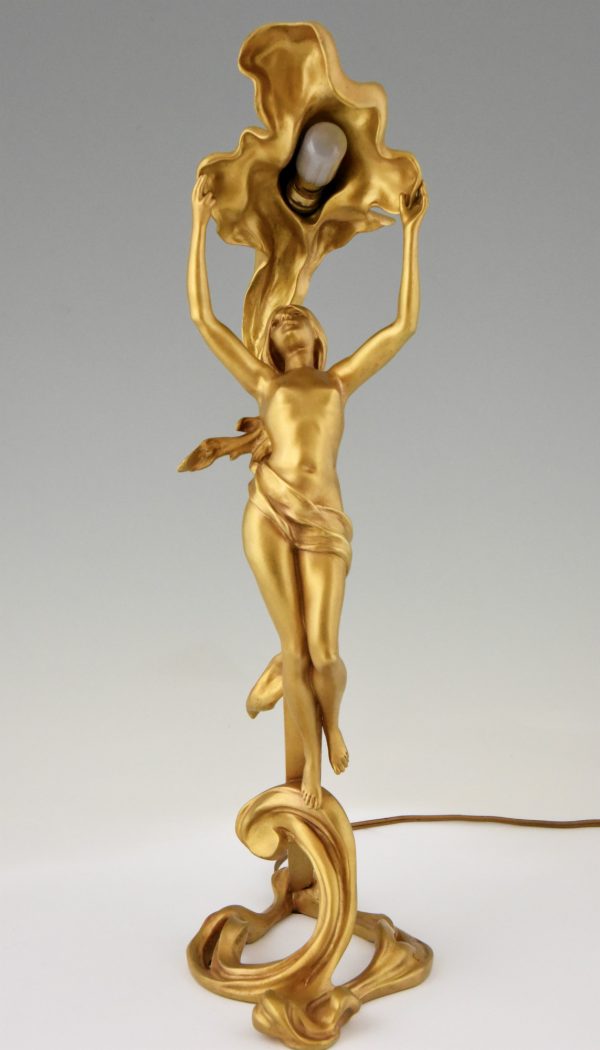 Art Nouveau gilt bronze lamp with nude.