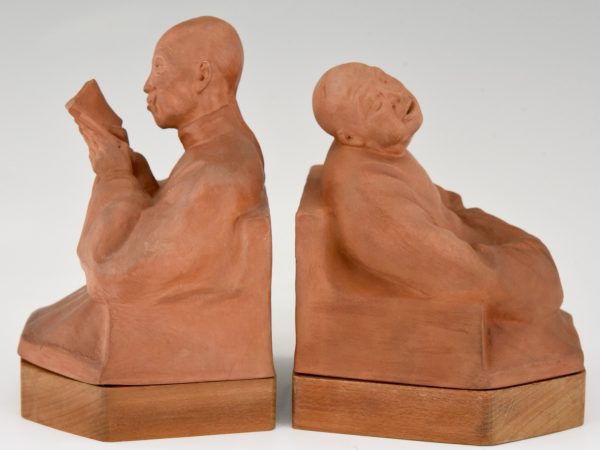 Art Deco terra cotta bookends with Chinese men  