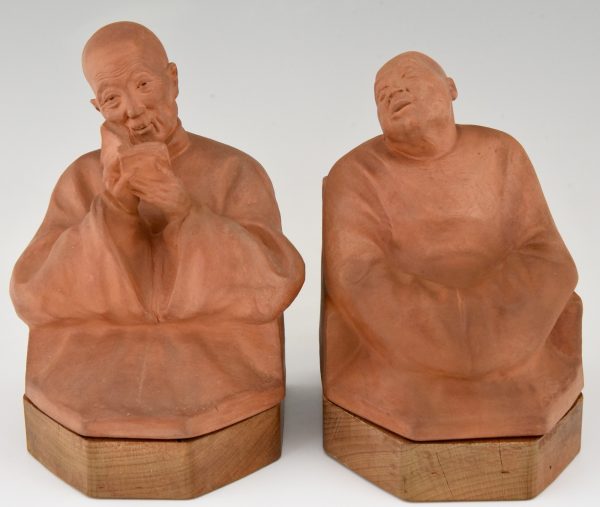 Art Deco terra cotta bookends with Chinese men  