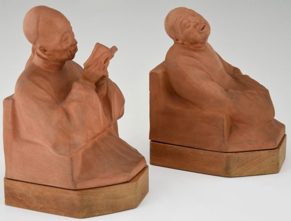 Art Deco terra cotta bookends with Chinese men  