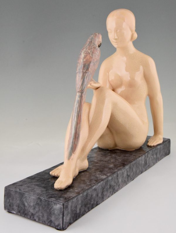 Art Deco ceramic sculpture seated nude with parrot
