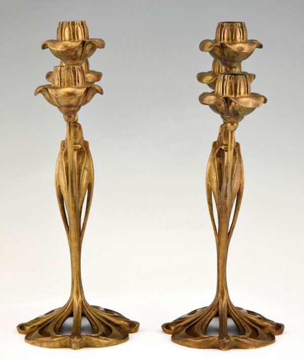 Pair of bronze Art Nouveau candelabra with floral design