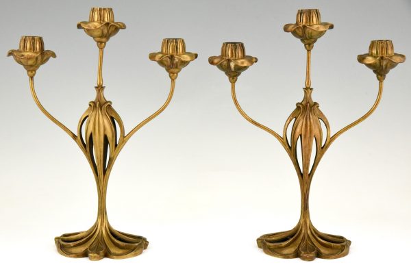 Paar bronzen Art Nouveau kandelaars floraal