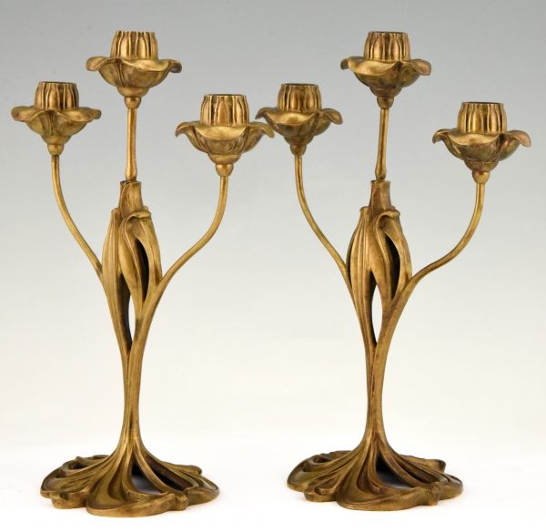 Pair of bronze Art Nouveau candelabra with floral design