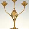 Pair of bronze Art Nouveau candelabra with floral design