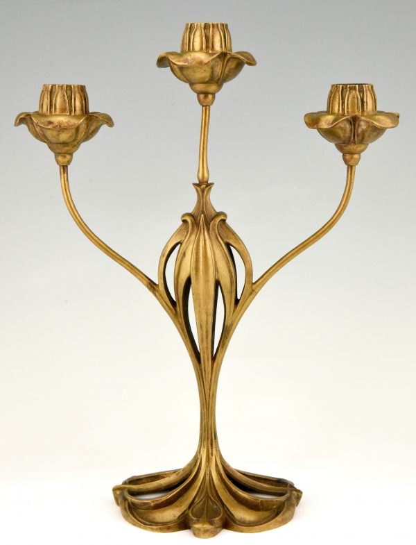 Pair of bronze Art Nouveau candelabra with floral design