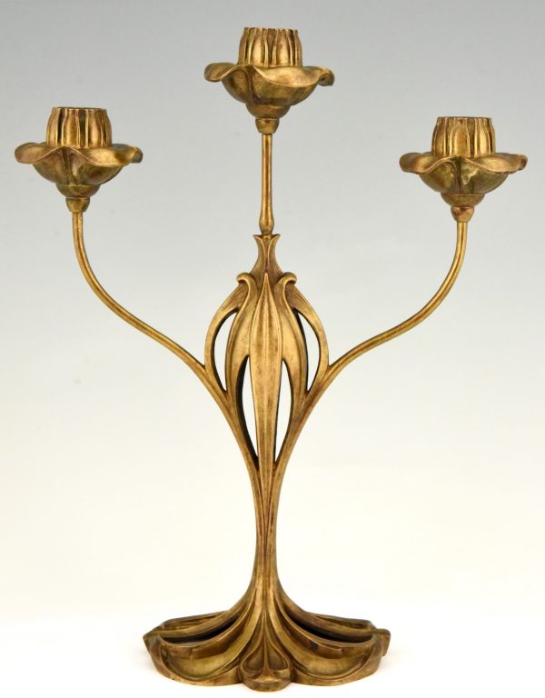 Pair of bronze Art Nouveau candelabra with floral design