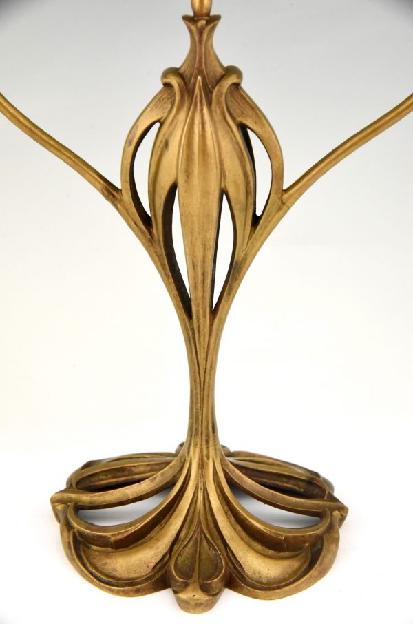 Pair of bronze Art Nouveau candelabra with floral design