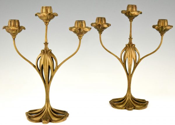 Pair of bronze Art Nouveau candelabra with floral design