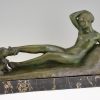 Art Deco bronze sculpture of a reclining nude with goats