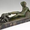 Art Deco bronze sculpture of a reclining nude with goats