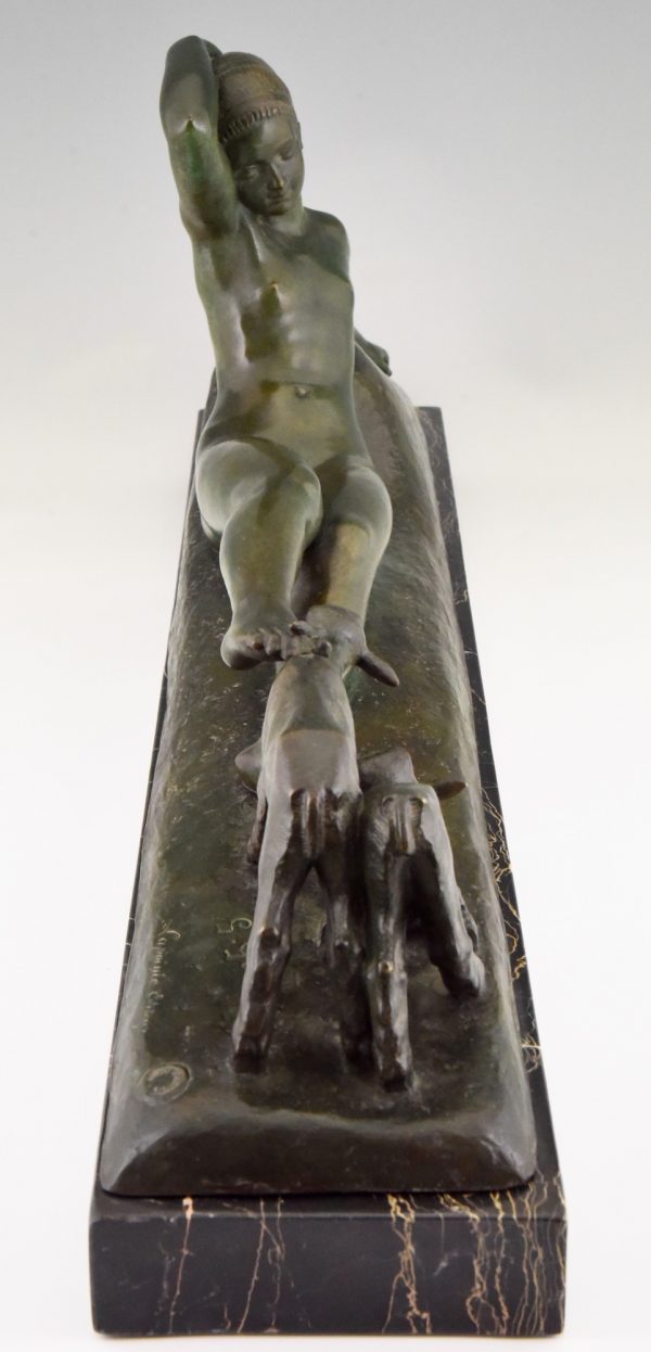 Art Deco bronze sculpture of a reclining nude with goats