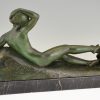 Art Deco bronze sculpture of a reclining nude with goats