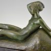 Art Deco bronze sculpture of a reclining nude with goats