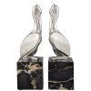 Art Deco silvered bronze pelican bookends.