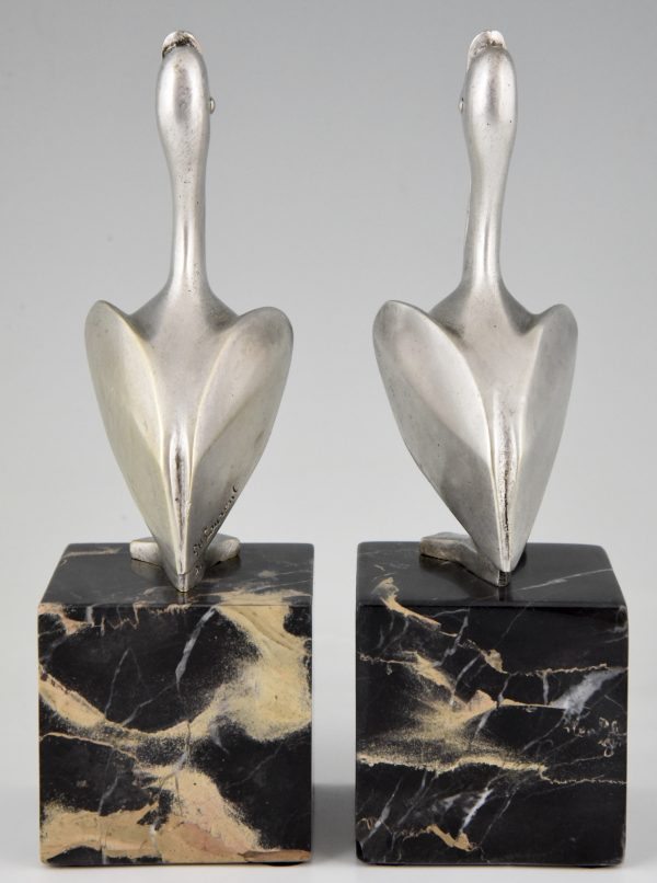 Art Deco silvered bronze pelican bookends.