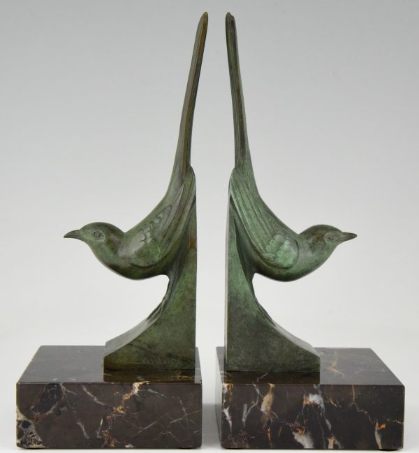 Art Deco bronzen boekensteunen vogels