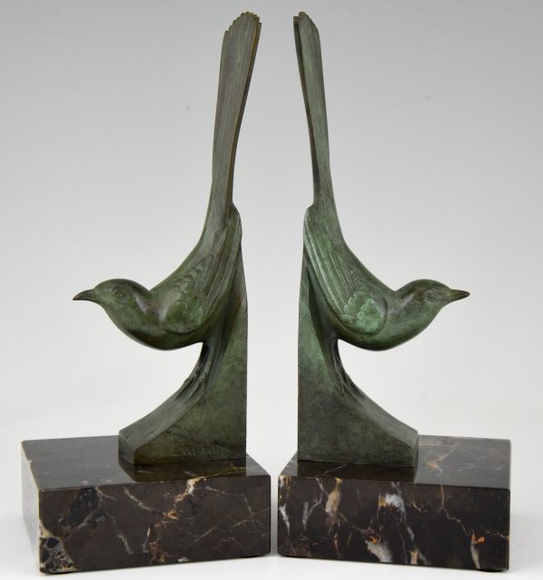 Art Deco bronzen boekensteunen vogels