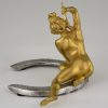 Art Nouveau bronze nude on a horseshoe