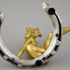 Art Nouveau bronze nude on a horseshoe