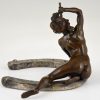 Art Nouveau bronze sculpture nude on a horseshoe