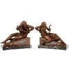 Art Deco bookends man with music book and woman with lyre