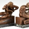 Art Deco bookends man with music book and woman with lyre