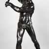 Half size sculpture male nude with sledgehammer 