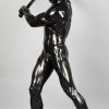 Half size sculpture male nude with sledgehammer 