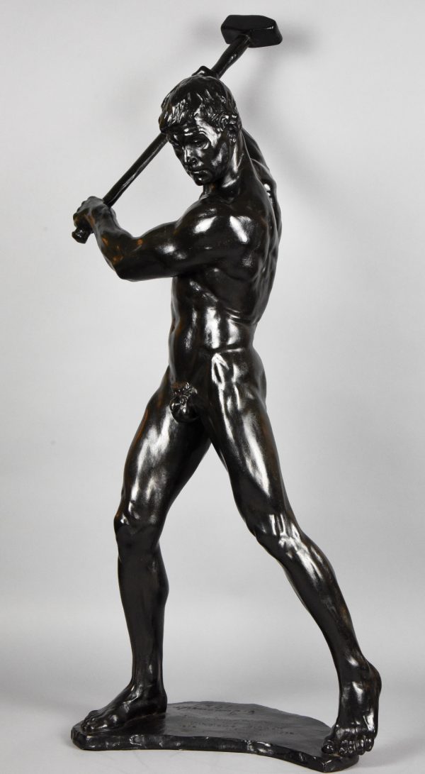 Half size sculpture male nude with sledgehammer 