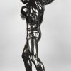 Half size sculpture male nude with sledgehammer 