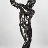 Half size sculpture male nude with sledgehammer 