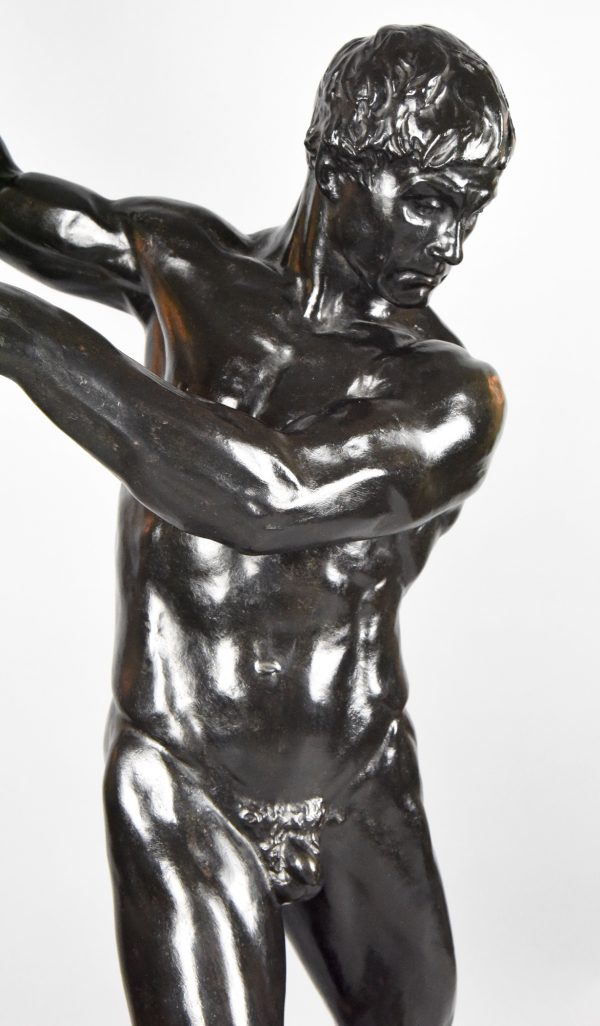 Half size sculpture male nude with sledgehammer 