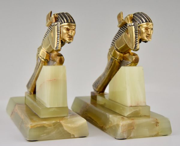 A pair of Indian Art Deco bronze bookends.