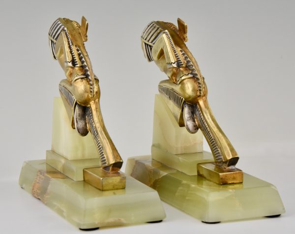 A pair of Indian Art Deco bronze bookends.