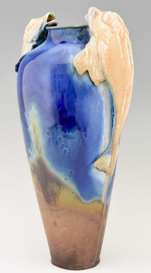 Art Deco blue ceramic vase with fish handles