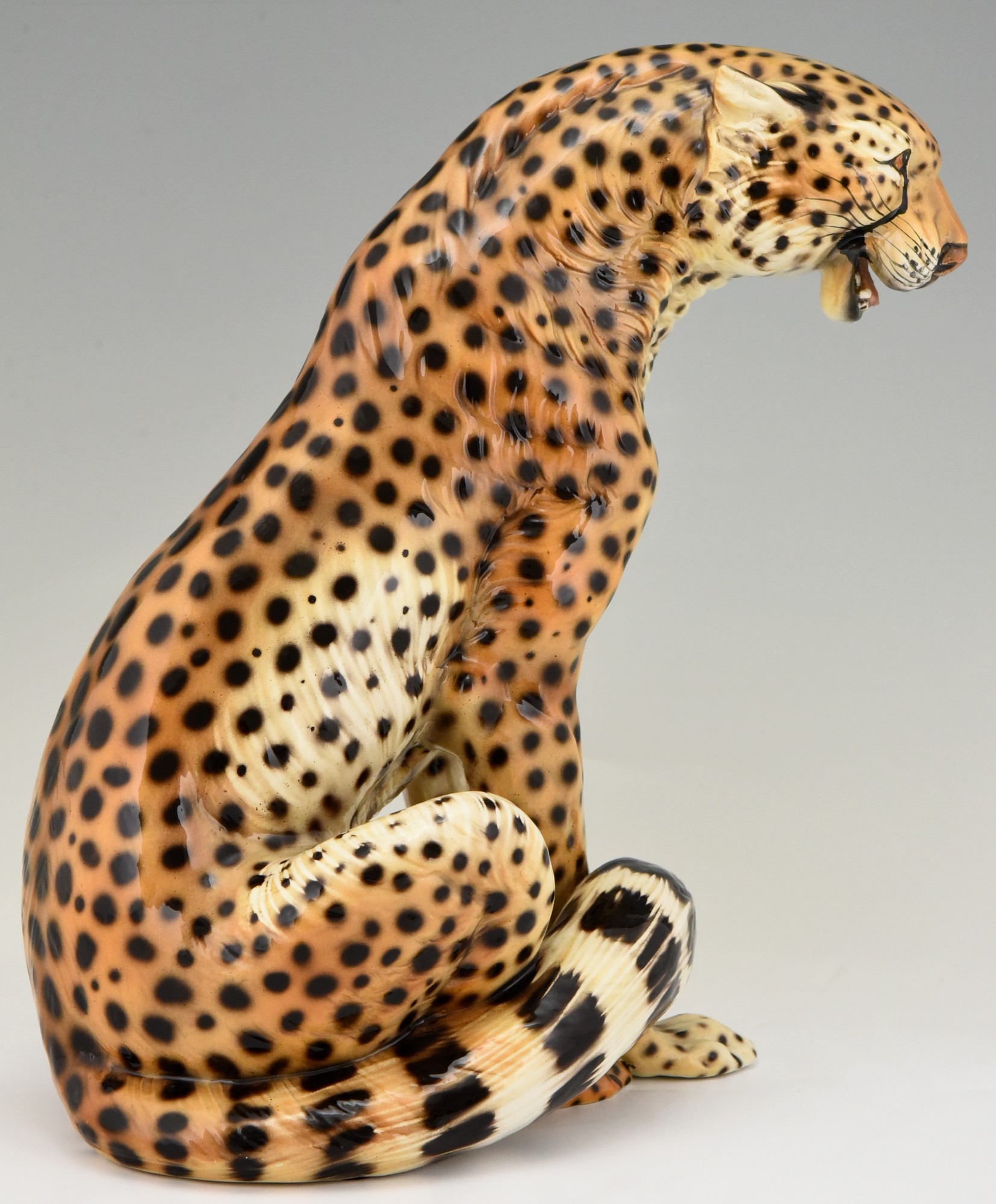 Mid Century Ceramic cheetah leopard sculpture. - Deconamic