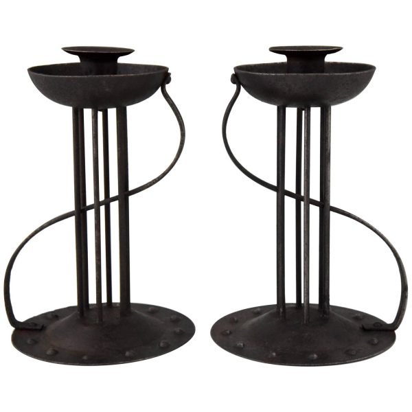 Pair of Art Nouveau iron candlesticks