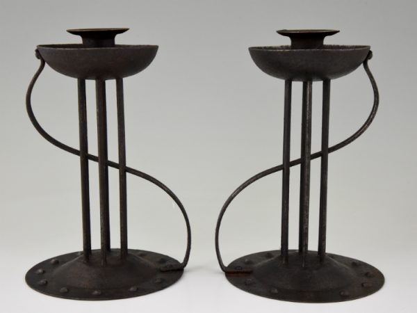 Pair of Art Nouveau iron candlesticks