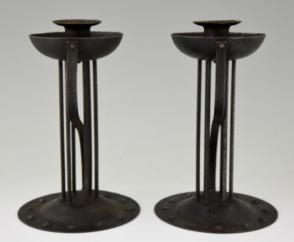 Pair of Art Nouveau iron candlesticks