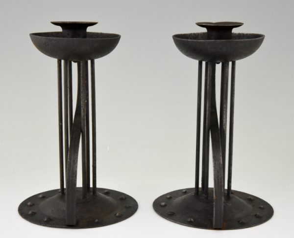 Pair of Art Nouveau iron candlesticks